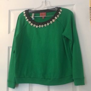 Green sweatshirt with leather and jewel detail